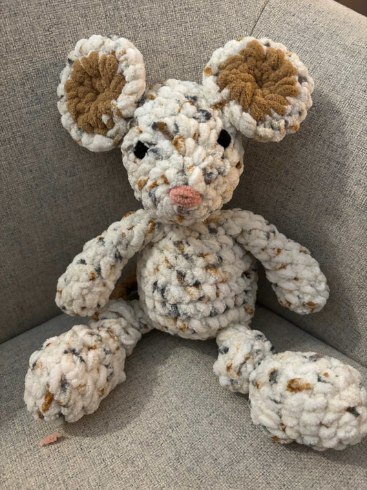 Cute toy mouse sitting front facing